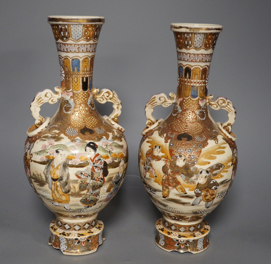 A pair of Japanese satsuma pottery vases, 30.5 cm high